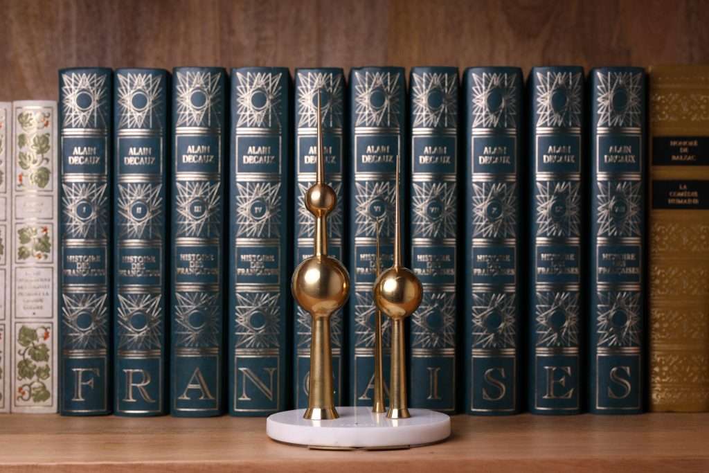 The Turath Kuwait Towers replica set displayed on a bookshelf, showcasing its elegant design and connection to heritage.