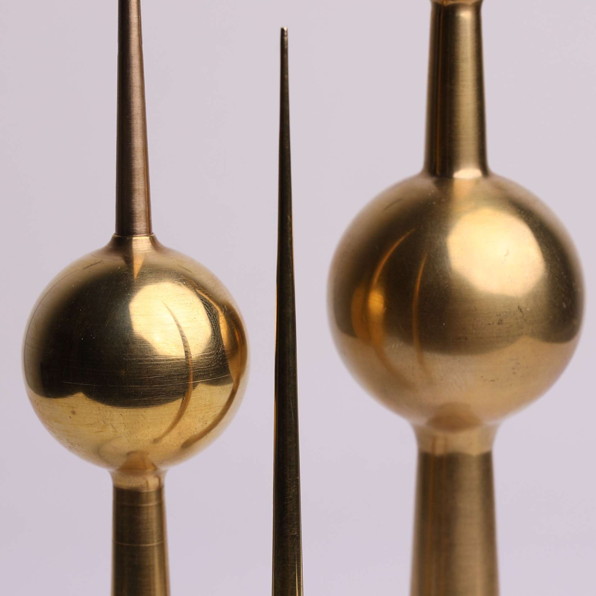 A detailed close-up of the Turath Towers replica set, showcasing their unique shapes and polished surfaces.